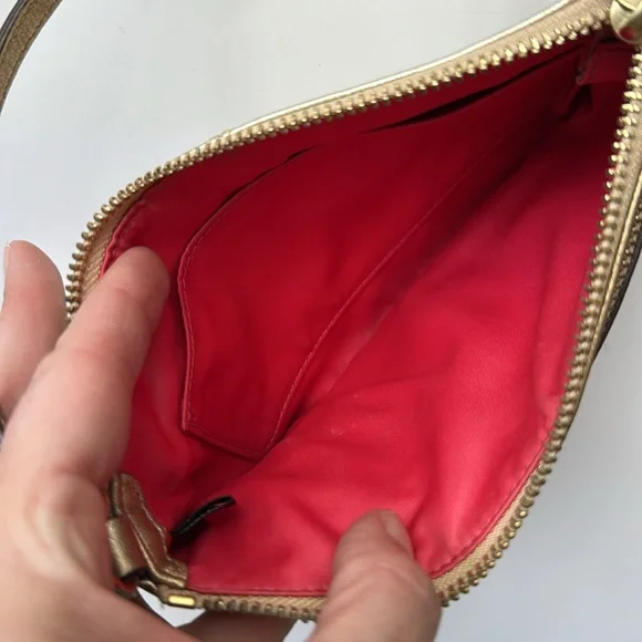 Gold metallic Coach legacy Zippy leather wristlet/baguette Clutch